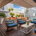 Cape Town Marriott Hotel Crystal Towers rooftop terrace with blue lounge chairs and city views in Cape Town
