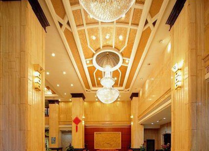 Century Star Hotel Foshan lobby with chandeliers, marble floor, and ornate ceiling