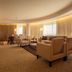 Gran Bourbon Hotel Asuncion in Asuncion living room-style suite with seating area and large windows