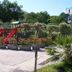 Hotel Belvedere in Caserta features an outdoor playground with slides, planters, and greenery