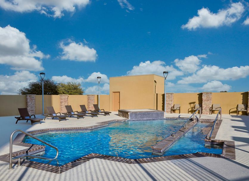 Fairfield Inn by Marriott Fort Stockton outdoor pool with lounge chairs and blue sky
