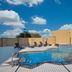 Fairfield Inn by Marriott Fort Stockton outdoor pool with lounge chairs and blue sky