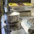 Buffet setup at Hotel 4 Stagioni Sensus Spa in Bardolino with covered chafing dishes and condiment jars