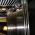 Ideal Hotel Pratunam in Bangkok interior elevator with mirrored walls and perforated ceiling lights