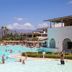 Borgo di Fiuzzi Resort & Spa in Praia a Mare with large outdoor pool and mountain backdrop
