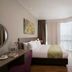 Somerset Medini Iskandar Puteri bedroom with floor-to-ceiling window and city view in Gelang Patah