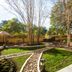La Quinta Inn & Suites by Wyndham Austin Southwest in Austin with landscaped garden and curved walkway