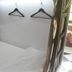 Vintage Inn Boutique Capsule @ Little India, Singapore: capsule bed with white linens and wall hooks
