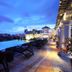Chillax Resort Bangkok rooftop infinity pool lounge with city skyline at dusk