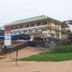 Calangute Residency in Calangute, exterior view with stairs, palm trees, and sandy frontage