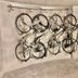 Hotel & Restaurant Goldener Pflug, Ludwigsburg: bicycles stored on wall-mounted racks in a concrete room