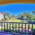 La Fiesta Ocean Inn And Suites in St. Augustine balcony view of palm gardens and the ocean beyond