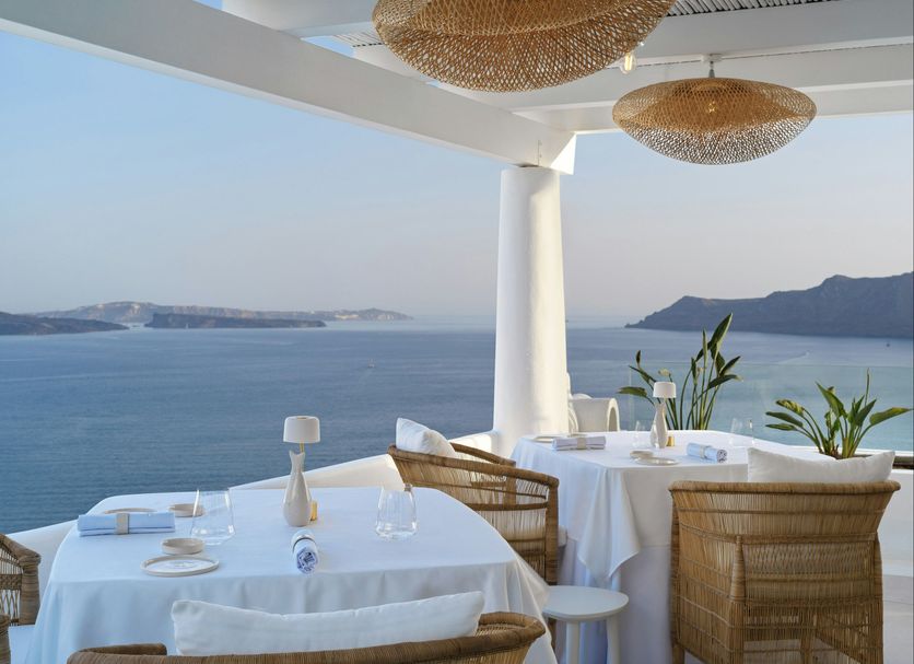Katikies Hotel, Thera: seaside terrace dining with panoramic Aegean and caldera views