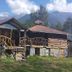 Salkantay Hostel Chaullay in Santa Teresa, rustic cabins with mountain views and grassy grounds