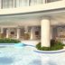 Hyatt Place Panama City Beach/Beachfront indoor pool with floating loungers and landscaped columns in Panama City Beach