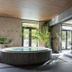 Best Western Valhall Park Hotell in Ängelholm, indoor round hot tub beside glass doors and lounge area