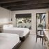 Andaz Scottsdale Resort & Bungalows guest room with two beds and patio garden view in Scottsdale