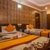 OYO 11457 Kathmandu Resort Hotel in Kathmandu twin-bed guest room with patterned bedding