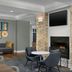 Homewood Suites by Hilton Huntsville-Village of Providence lobby with fireplace, TV and seating