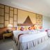100 Islands Resort & Spa in Surat Thani, spacious twin bed room with balcony garden view
