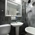 Hotel Atti Incheon bathroom with shower, pedestal sink, toilet, and freestanding bathtub