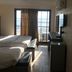 Ahla Tala Hotel in Aqaba room with twin beds, TV, and balcony sea view