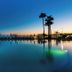Kn Hotel Arenas Del Mar - Adults Only pool at dusk in El Médano with palm tree reflections and ocean view