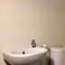 Infinite Residence Bandung bathroom with wall-mounted sink and toilet, Bandung