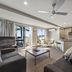 Pavilion Beachfront Apartments in Mount Maunganui living area with balcony and sea view