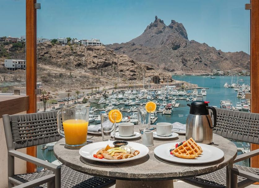 Marinaterra Hotel & Spa in San Carlos: balcony breakfast with marina and mountain views