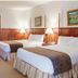 Hanah Mountain Resort And Country Club in Margaretville guest room with two beds and lamps