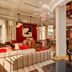 Estimar Valencia in Valencia: stylish lounge with red bar stools and a sleek cocktail bar interior