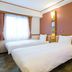 Toyoko Inn Himeji eki Shinkansen Minami guchi room with two twin beds and window in Himeji