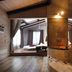EcoResort Il Cantico della Natura in Magione: rustic suite with skylights and a glass-enclosed bathtub