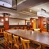 Fairfield Inn & Suites by Marriott Boise Nampa lobby lounge with fireplace, high tables and bar seating