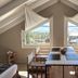 Los Ponchos Hotel in El Calafate dining room with twin windows and mountain views