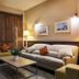 Hôtel Edmond Rostand Marseille lounge with sofa, coffee table, lamps and wood sliding door