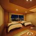 Ooedo Onsen Monogatari Dogo in Matsuyama: tatami room with twin beds and window city view