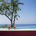 Casa Mermejita Mazunte ocean-view infinity pool with drinks and tree overlooking the sea