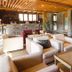 Reserva del Saja Hotel & Spa lounge in Renedo de Cabuérniga with sofas, fireplace and bar