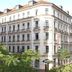 Galerie Hotel Leipziger Hof in Leipzig, exterior of a classic corner hotel building with trees in front