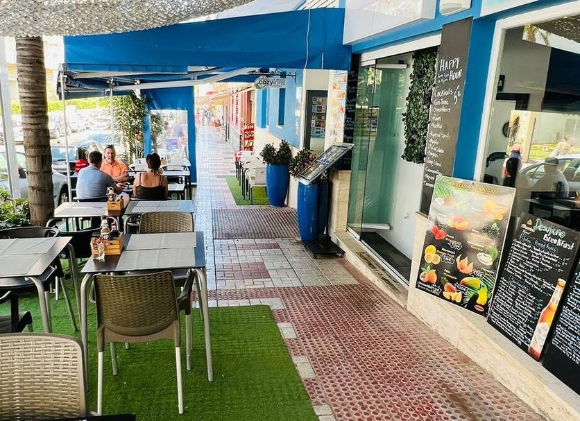 Bajondillo Beach Cozy Inns Adults Only in Torremolinos, outdoor terrace dining area with tables and chairs