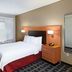 TownePlace Suites by Marriott Tulsa North/Owasso room with queen bed, desk, TV and window in Owasso