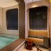 Hôtel Aoriste & Spa, Paris indoor spa pool with seating nook and arched windows