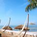 Emporio Mazatlan beachside hammocks with palm trees and ocean view in Mazatlán