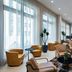 AC Hotel Fort Worth Downtown lobby with lounge seating, floor-to-ceiling windows and city views