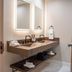 The Inn At Crestwood bathroom in Boone with double sink vanity, mirrors and towels