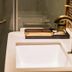 James Joyce Coffetel San Yuan LI Station Guangzhou bathroom sink with matte black faucet and mosaic tile wall