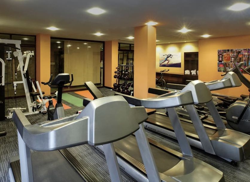 Sunrise Nha Trang Beach Hotel & Spa gym with treadmills, weight machines and exercise bikes