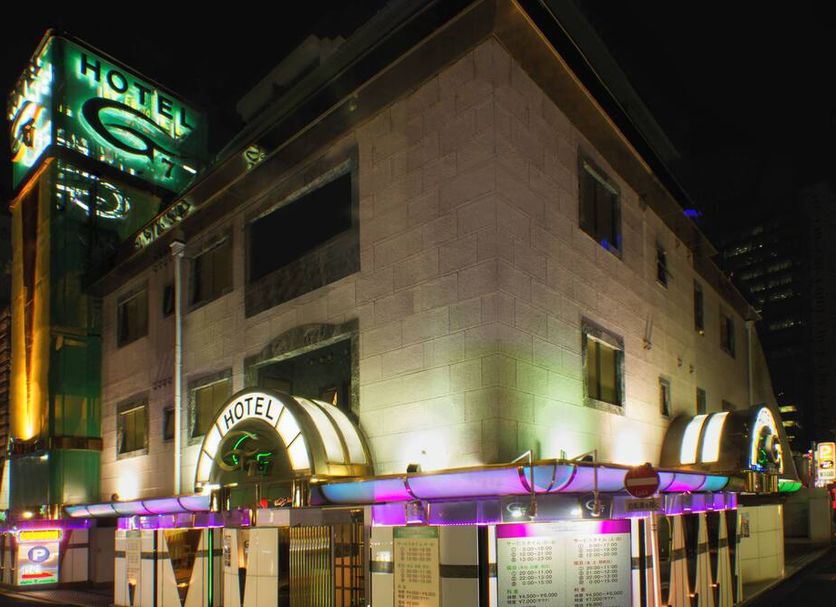 Hotel G7 - Adults Only in Tokyo, neon-lit exterior at night with illuminated entrance